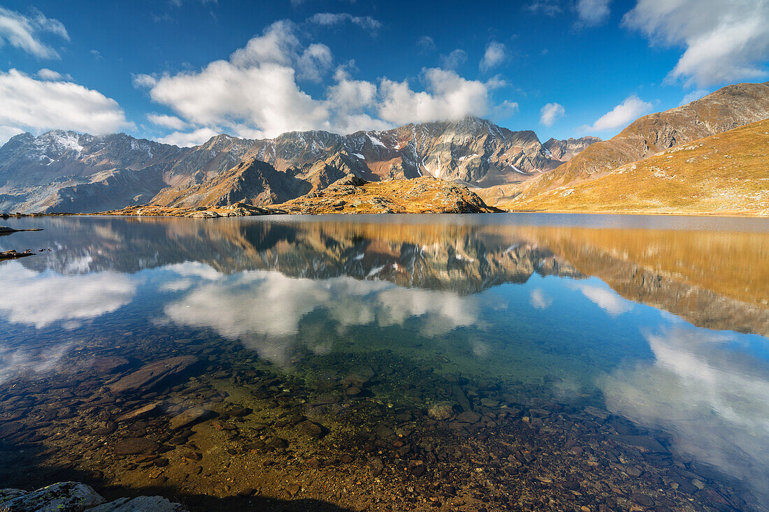 Black lake at Gaviapass in the morning, Brescia province in Lombardy district, Italy.