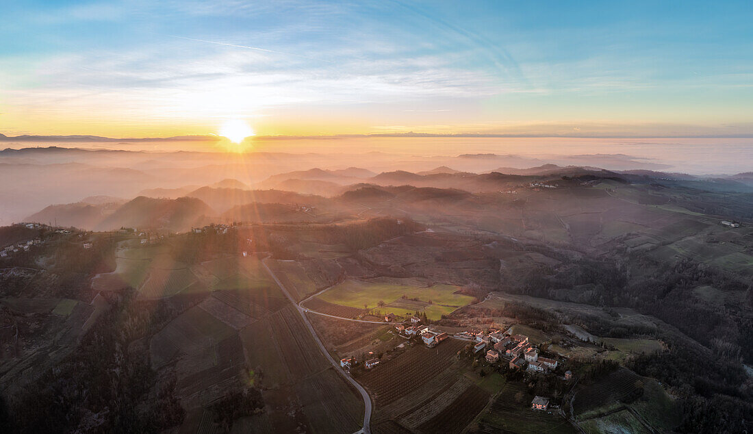 Panoramic aerial view of Alessandria hills with fog, Alessandria province, Piedmont, Italy, Europe.