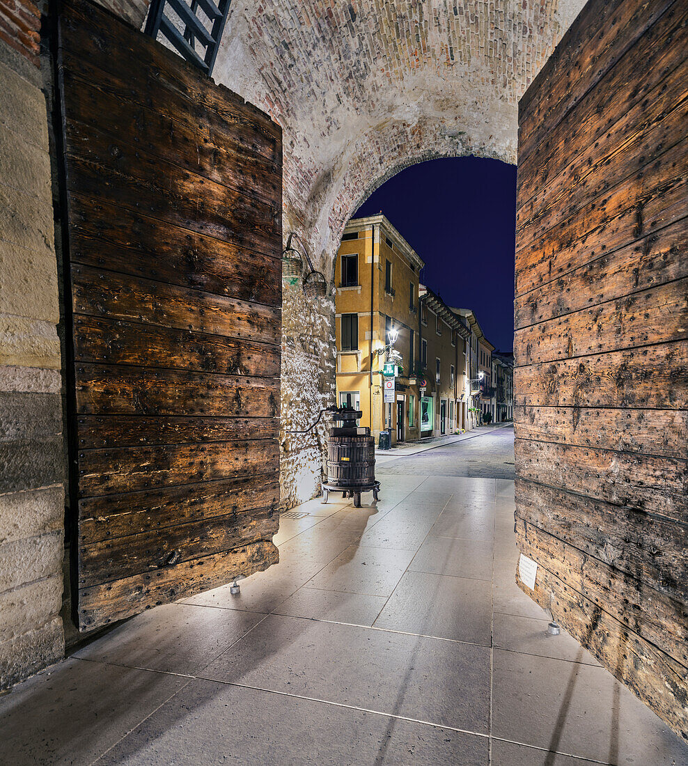 Verona door, historical entrancy in the center of Soave during the night with a part of Soave center in background Soave, Verona, Veneto, Italy, Europe, south Europe