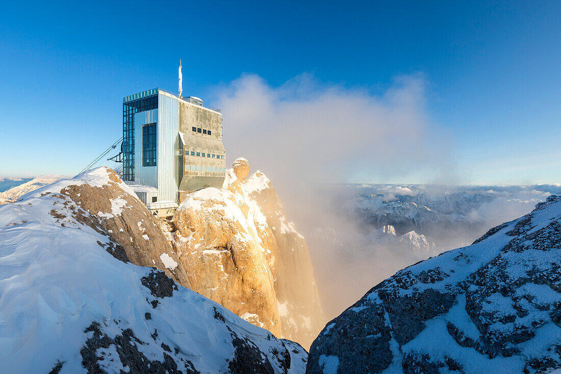 Punta Rocca cable way at sunset. Marmolada, Veneto, Italy, Europe.