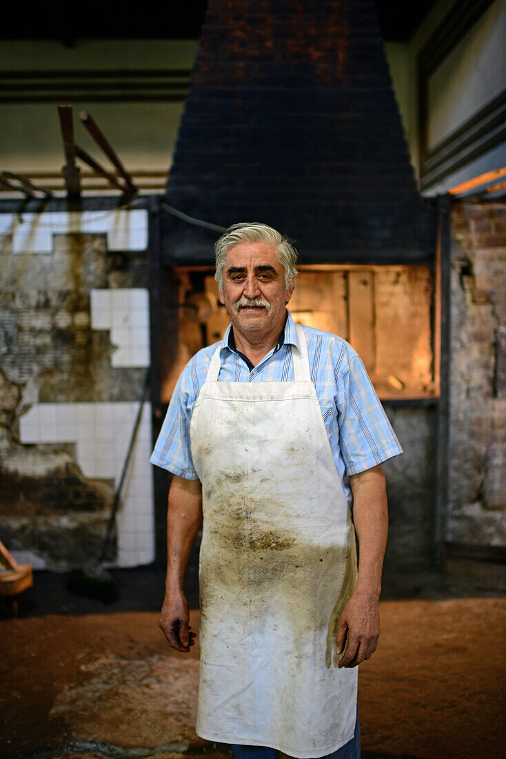 Baker at El Boleo bakery in Santa Rosalia, Baja California Sur, Mexico