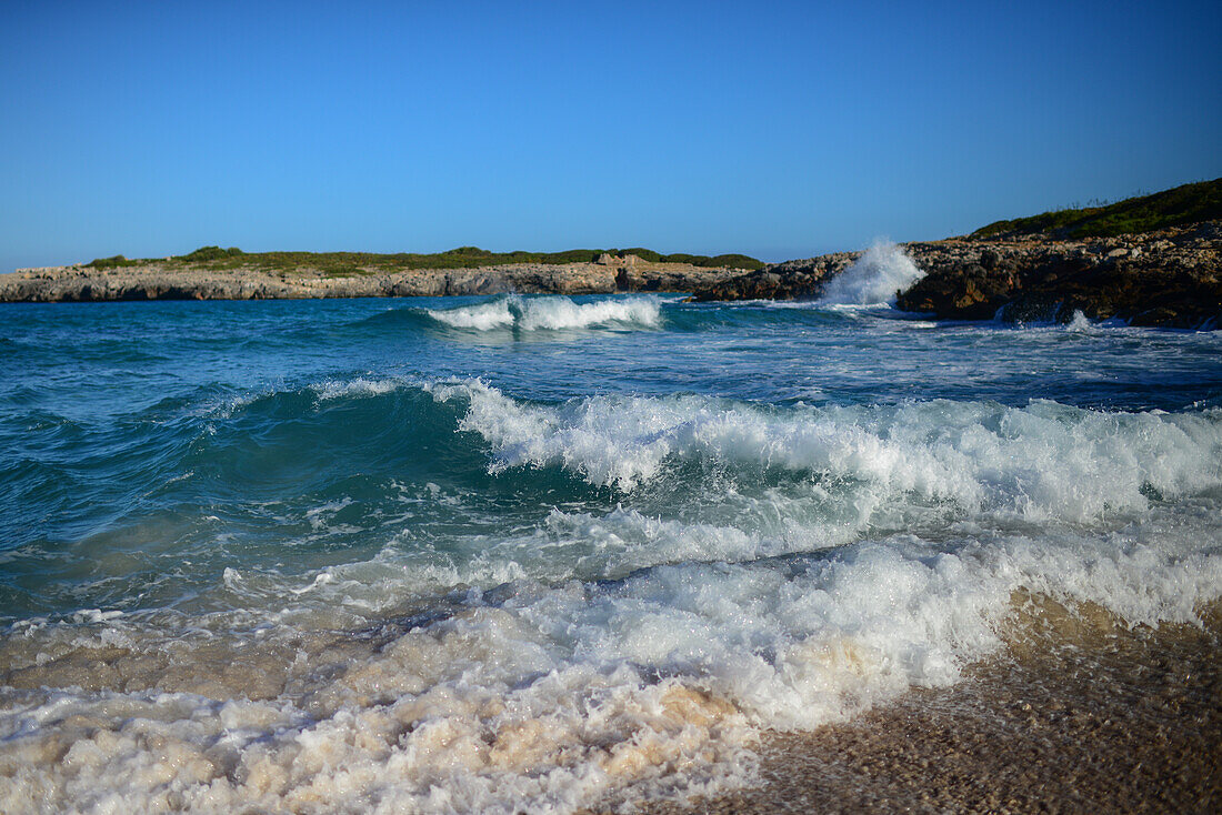 Waves hit the rocks in Cala Varques in Mallorca, Spain