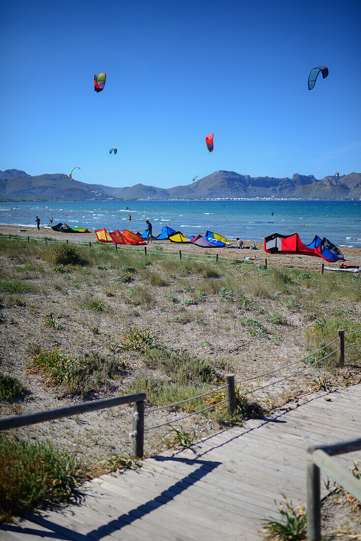 Kitesurfing in Port de Pollenca beach, Mallorca, Spain