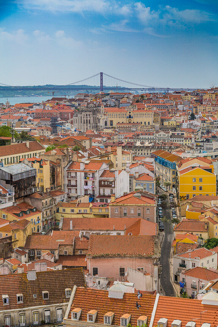 Lisbon, Portugal. The old quarter of Alfama and view on the Ponte do 25 Abril bridge