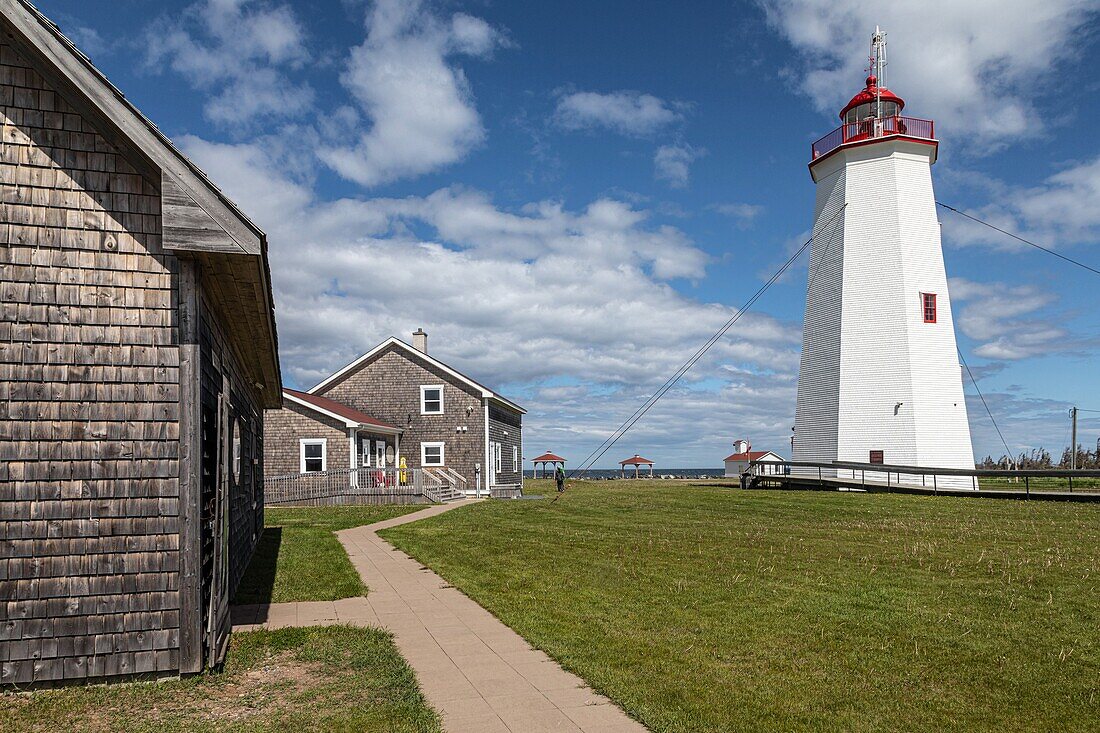 Wooden lighthouse and cafe du gardien, miscou island, new brunswick, canada, north america