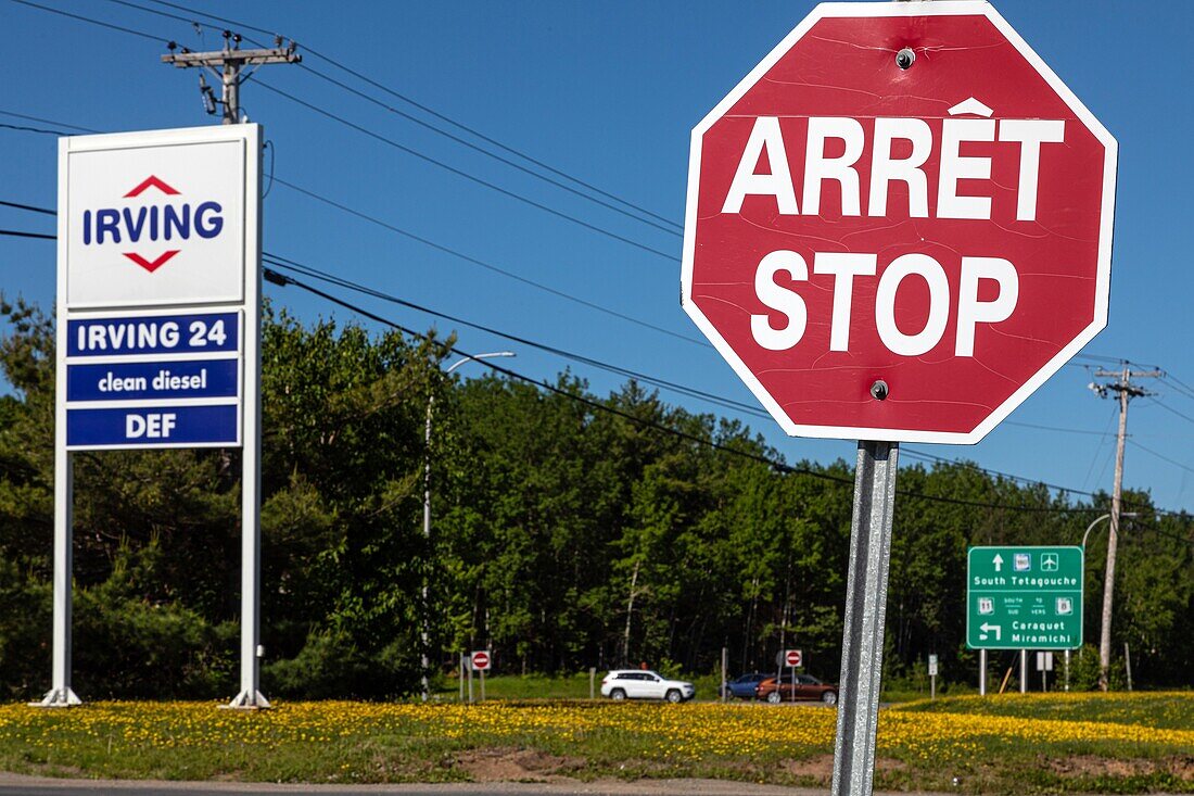 Stop-arret sign in the only canadian province that is officially bilingual, moncton, new brunswick, canada, north america