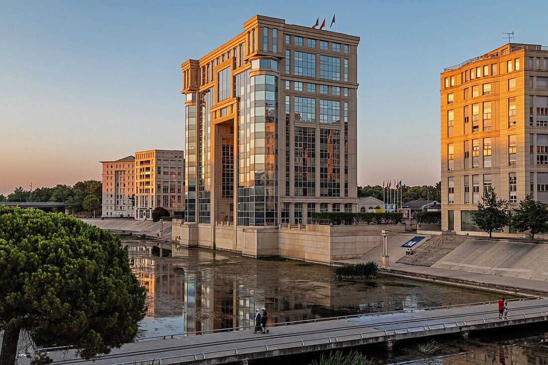 Anguedoc-roussillon regional council headquarters on the banks of the lez, avenue de pompignane, montpellier, herault, occitanie, france