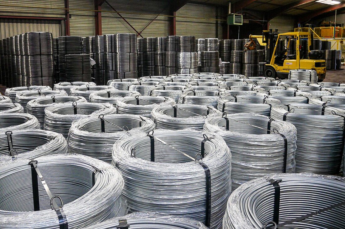 Storage of the spools before delivery, manufacture of spools of steel wire for use in industry, sntn - societe nouvelle de trefilerie normande (norman wire works corporation), neaufles-auvergny, eure, normandy, france