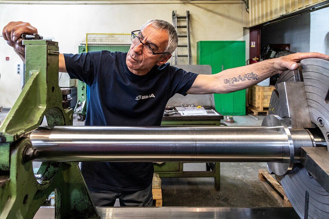 Adjusting the equipment before the machining of metal parts, sma, societe mecanique aiglonne, metallurgical industry, saint-martin-d'ecublei, orne, normandy, france