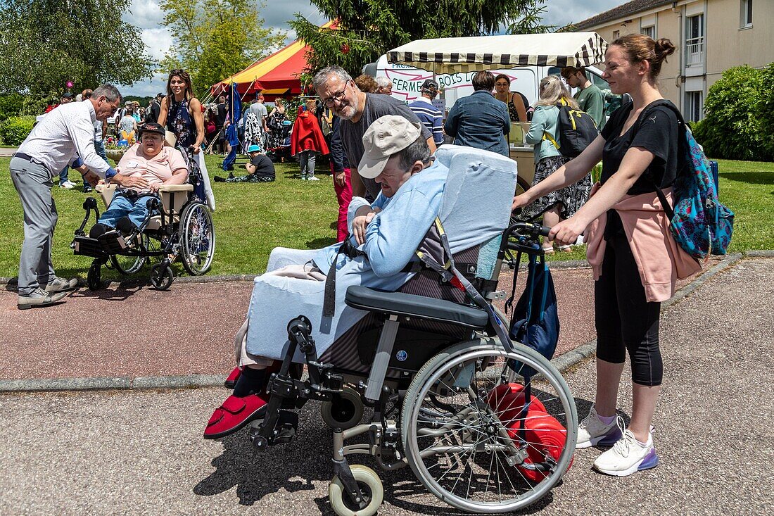 Party day for the handicapped residents and their families, foyer jules ledein, la neuville-du-bosc, eure, normandy, france