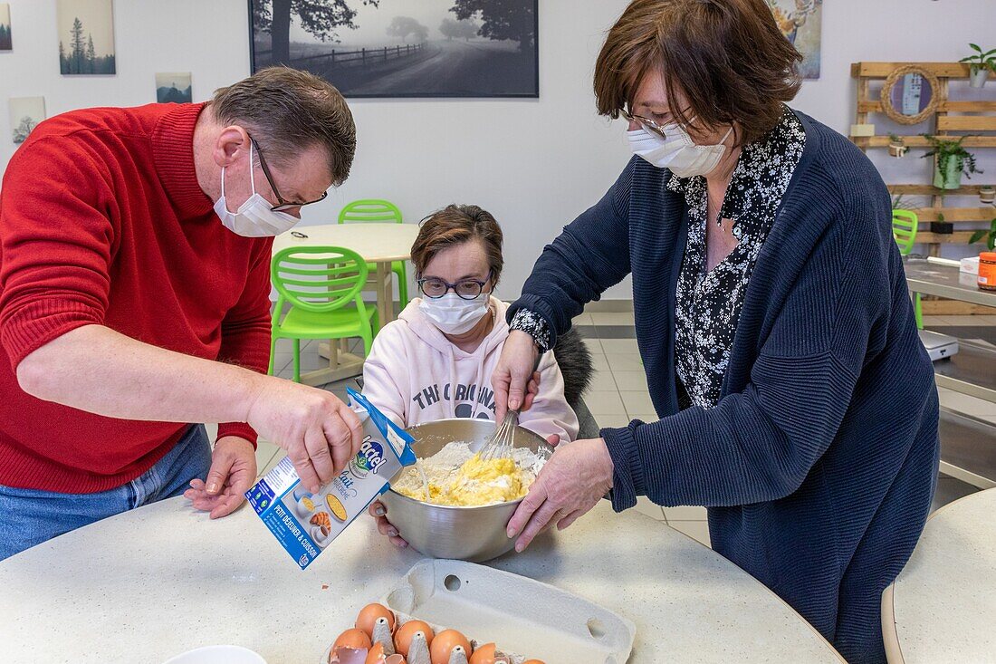 Making crepes with the monitors, care home for adults with mental disabilities, residence la charentonne, adapei27, association departementale d'amis et de parents, bernay, eure, normandy, france
