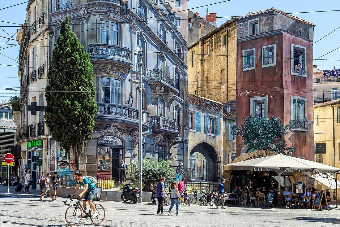 Terrace of the restaurant la trattoria and trompe l'oeil acades, place edouard adam et rue des etuves montpellier, herault, occitanie, france