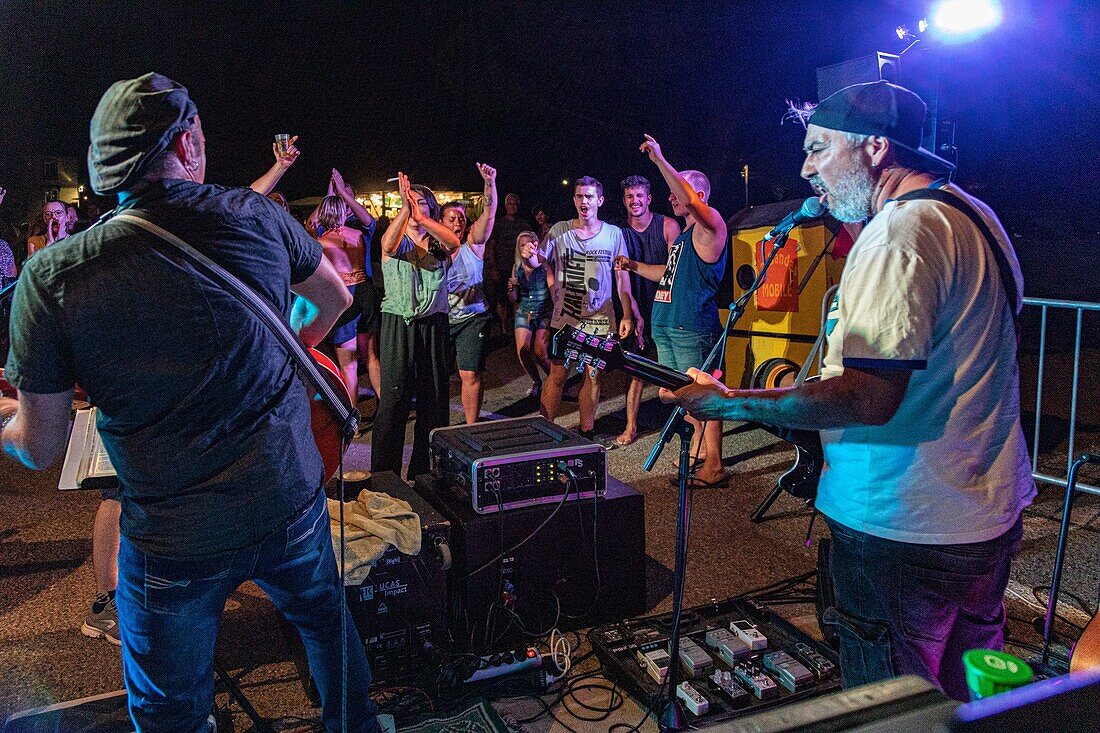 Open-air concert in the evening of bastille day, live music with the band mobile, homps, aude, occitanie, france