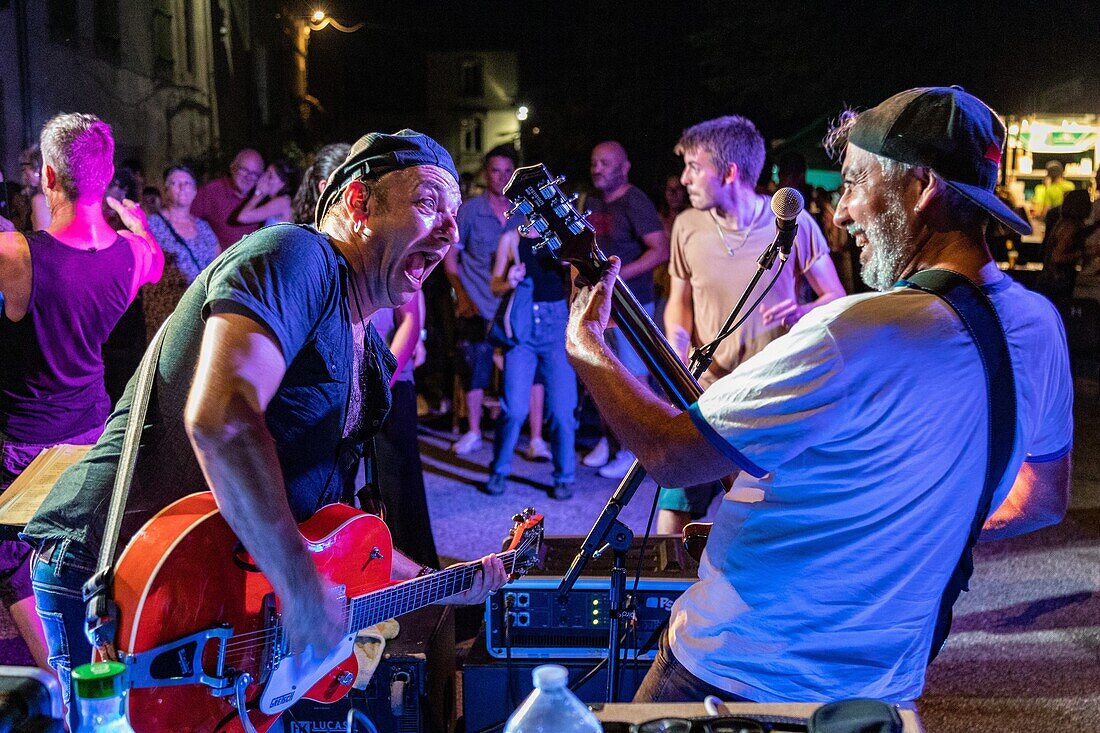 Open-air concert in the evening of bastille day, live music with the band mobile, homps, aude, occitanie, france