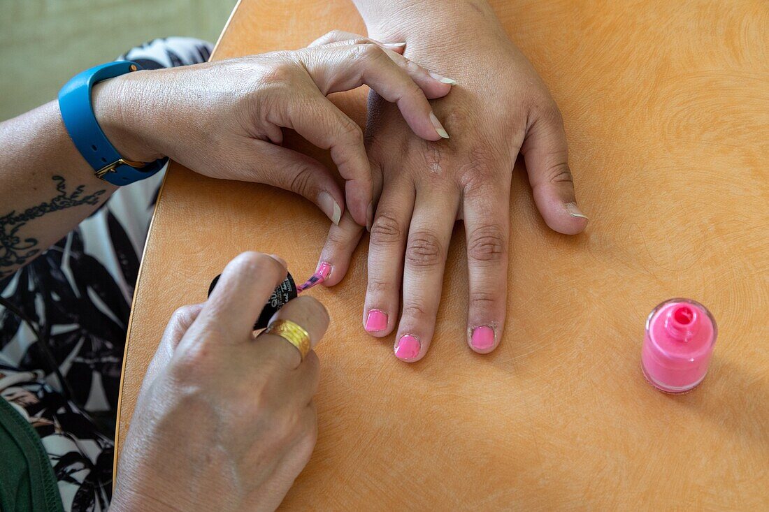 Nail polish, wellness and beauty workshop with the residents, sessad la rencontre, day care, support and service organization for people with disabilities, le neubourg, eure, normandy, france