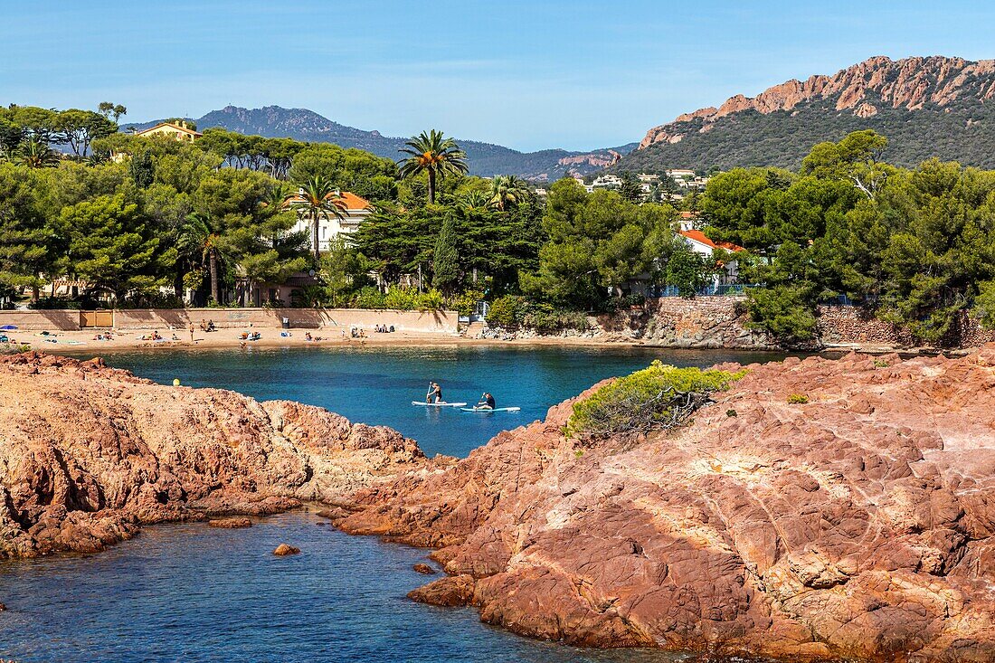 Beach of camp long and pointe longues, the red rocks seen from the coast path of cape dramont, saint-raphael, var, france