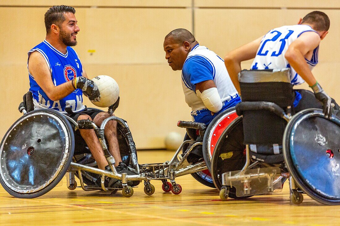 Handi rugby training, team sports for handicapped people in wheelchairs