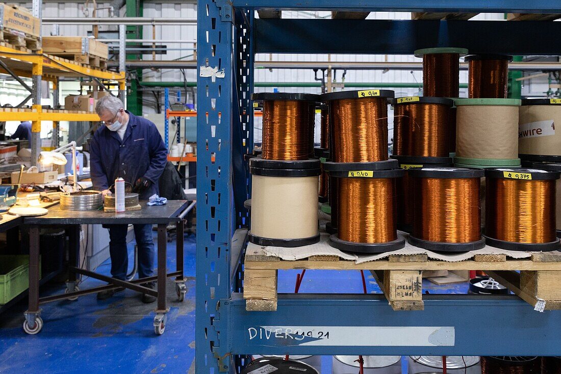 Bobbins of copper for the making of capacitors, the regnard technologies company, l'aigle, orne, normandy, france