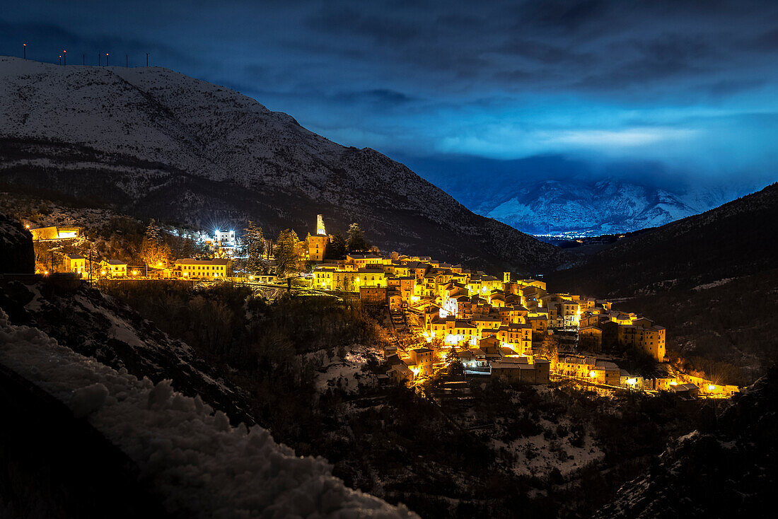 The illuminated village of Anversa degli Abruzzi in a winter evening, L’Aquila province, Abruzzo, Italy