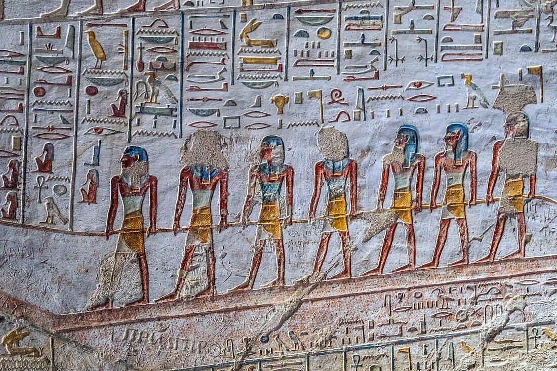 Bas-relief and frescoes painted in bright colors, egyptian hieroglyphs, figurative holy writings, tomb of the pharaoh merenptah, valley of the kings where the hypogeum of many pharaohs of the new empire can be found, luxor, egypt, africa