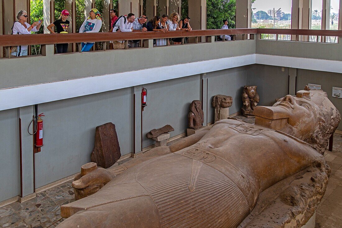 Detail of the pharaoh's faces, granite colossus of ramses ii, 10 metres long, mit rahina open-air museum, listed as a world heritage site by unesco, cairo, egypt, africa