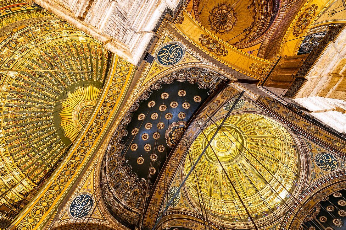 Half-dome cupolas ornamented with paintings and gilding, the center 52 metres high, inside the alabaster mosque of muhammad ali, 19th century turkish style, saladin citadel, cairo, egypt, africa