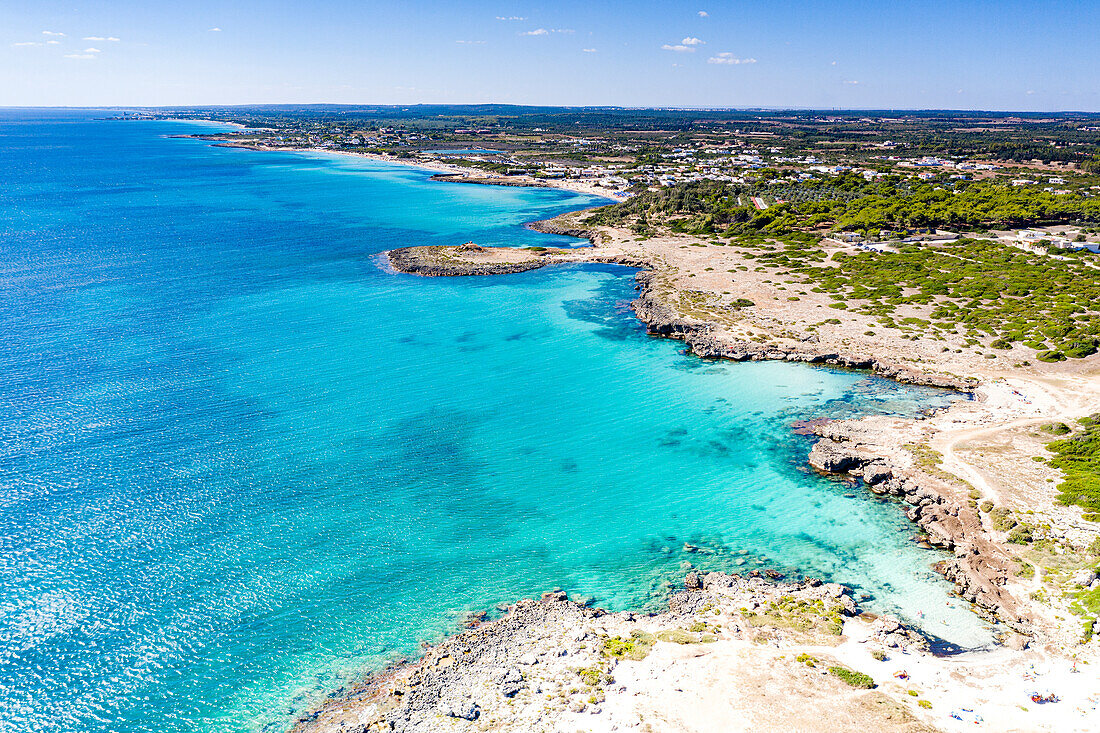 Aerial view of cliffs overlooking the turquoise sea, Torre Lapillo, Porto Cesareo, Lecce province, Salento, Apulia, Italy