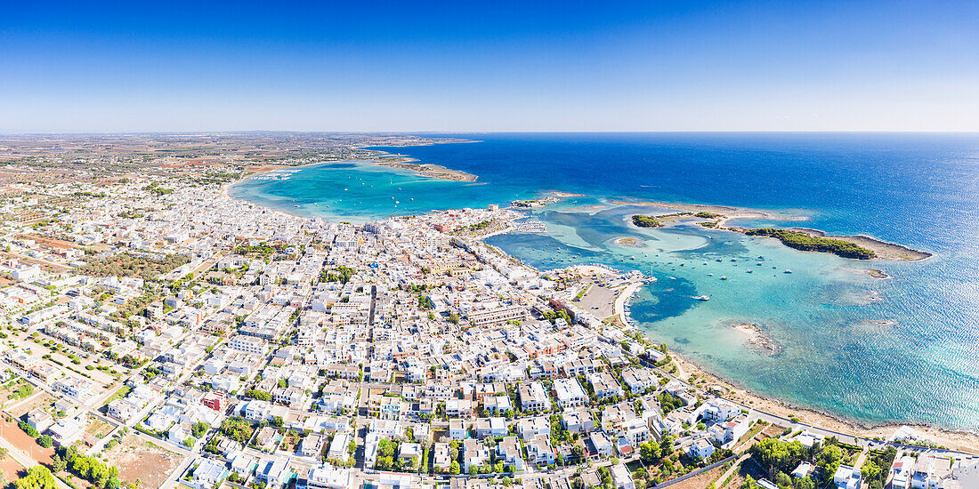 Aerial panoramic of Porto Cesareo tourist resort by Ionian Sea in summer, Lecce province, Salento, Apulia, Italy