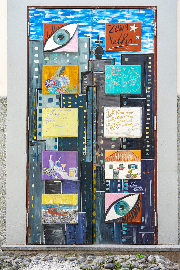 Colorful painted door in the old alley of Rua de Santa Maria, Funchal, Madeira island, Portugal