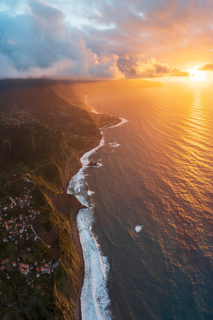 Aerial panoramic of the north coast with Arco de Sao Jorge and Ponta Delgada perched on cliffs, Madeira island, Portugal