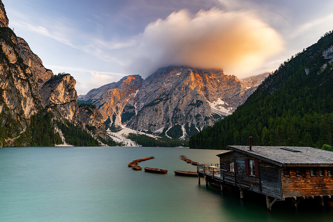 Sunset over lake Braies (Pragser Wildsee) and majestic Croda del Becco mountain, Dolomites, South Tyrol, Italy