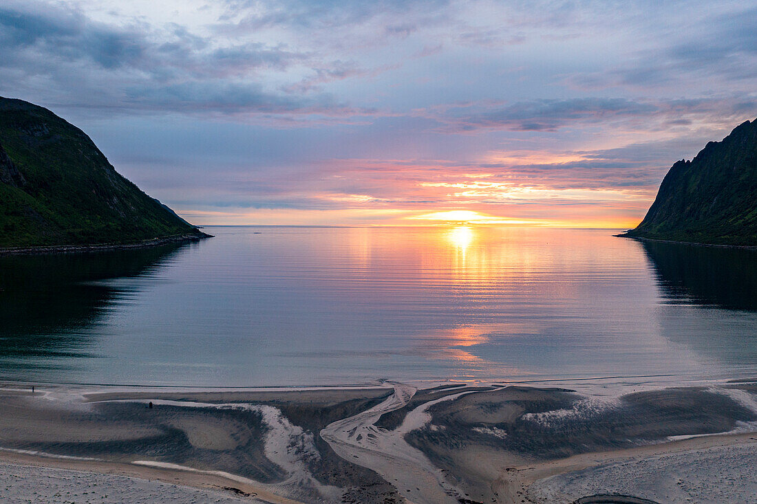 Aerial view of sand beach lit by the lights of midnight sun, Ersfjord, Senja, Troms county, Norway