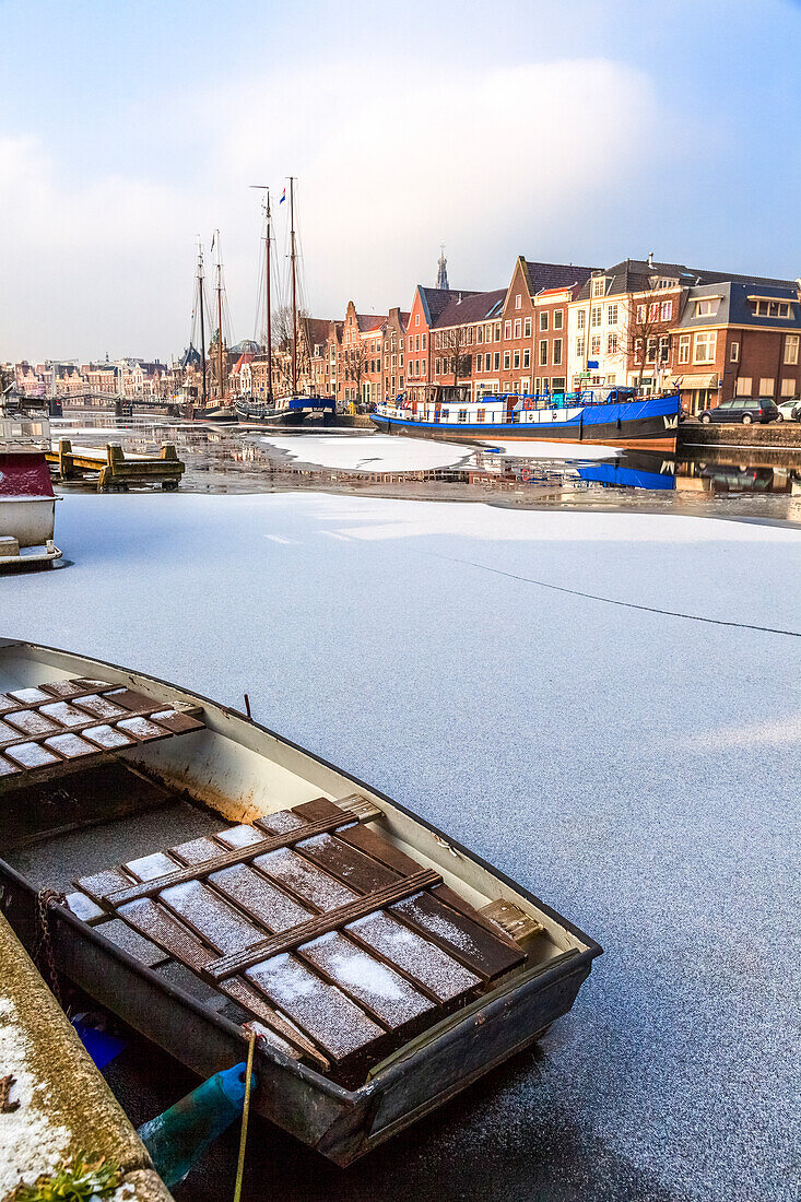 Frost and ice covering the Spaarne river old canal in winter, Haarlem, Amsterdam district, North Holland, The Netherlands