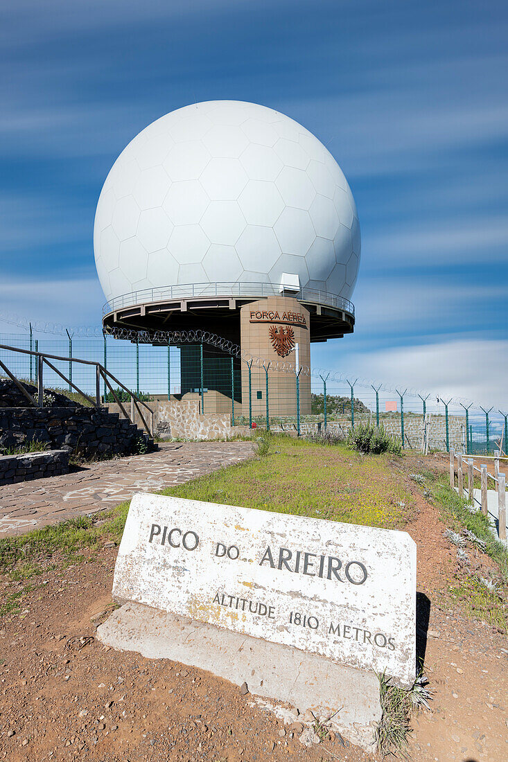 Placard and radar station on top of Pico do Arieiro mountain, Madeira, Portugal