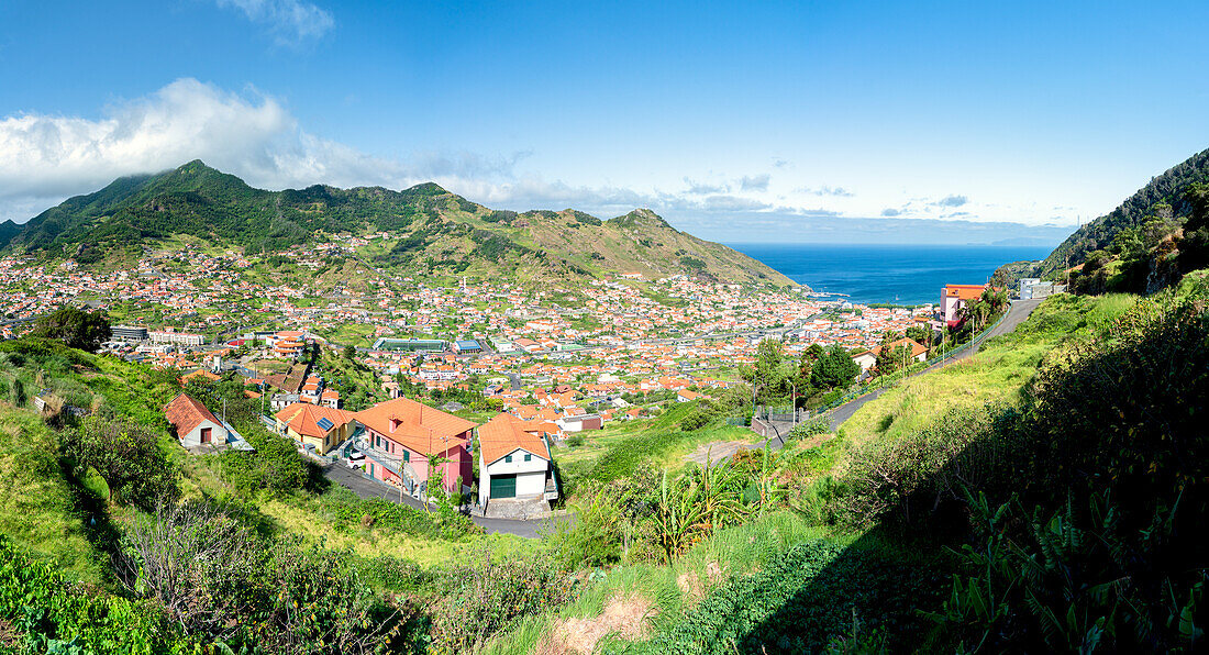 Coastal village of Machico set in a fertile valley in front of the ocean, Madeira island, Portugal