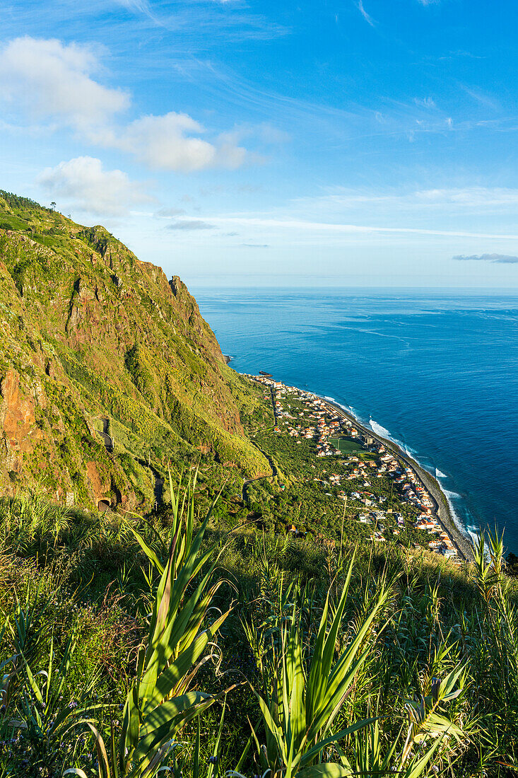Coastal village of Paul Do Mar view from the green landscape on the above mountains, Calheta, Madeira island, Portugal