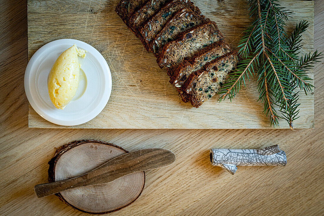 Salty butter with homemade bread on wood table background from above, Arctic Bath Hotel, Harads, Lapland, Sweden