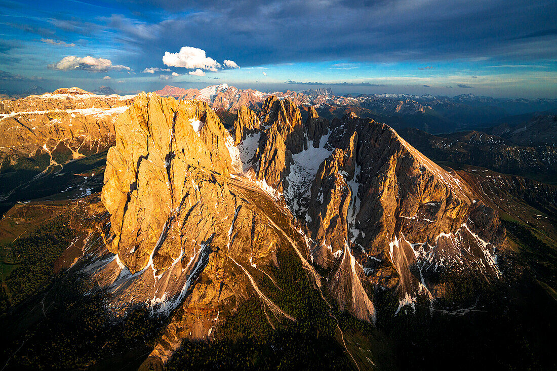 Sassolungo group and Sassopiatto at sunset, aerial view, Dolomites, South Tyrol, Italy
