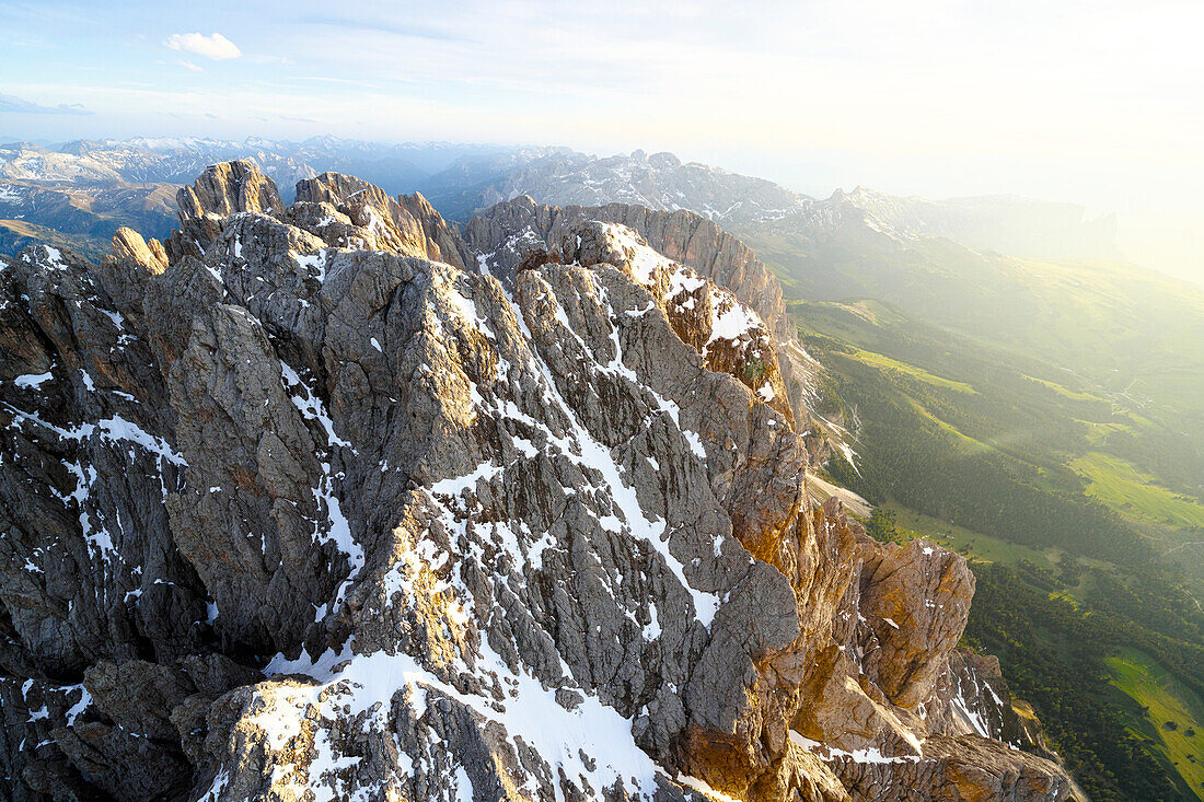 Aerial view of Sassolungo group at sunset, Dolomites, South Tyrol, Italy