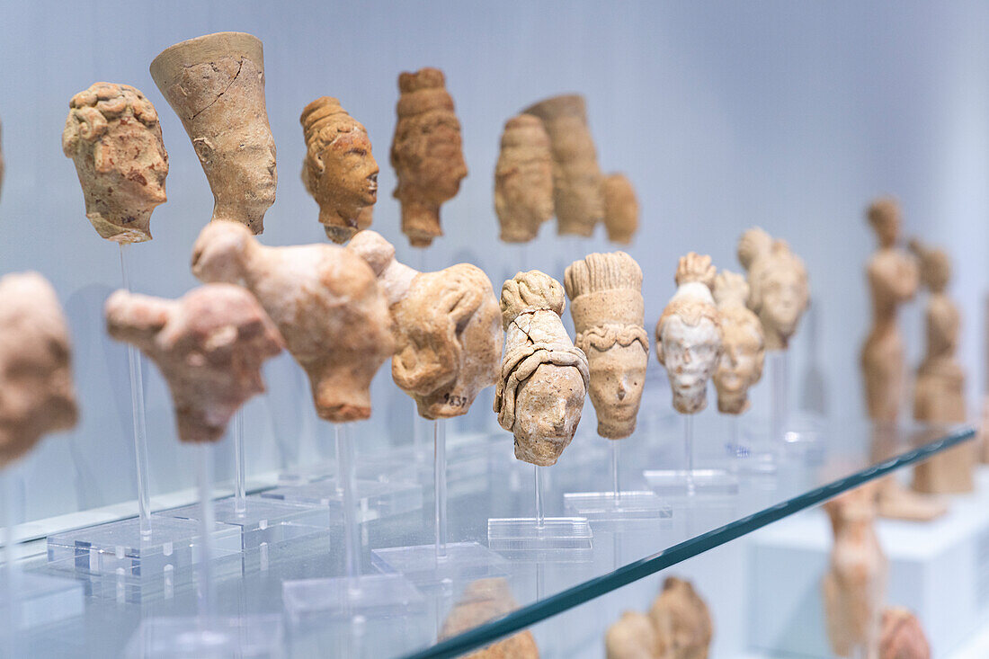Clay figurines of human heads of philosophers and goddess, Archaeological Museum of Heraklion, Crete, Greece
