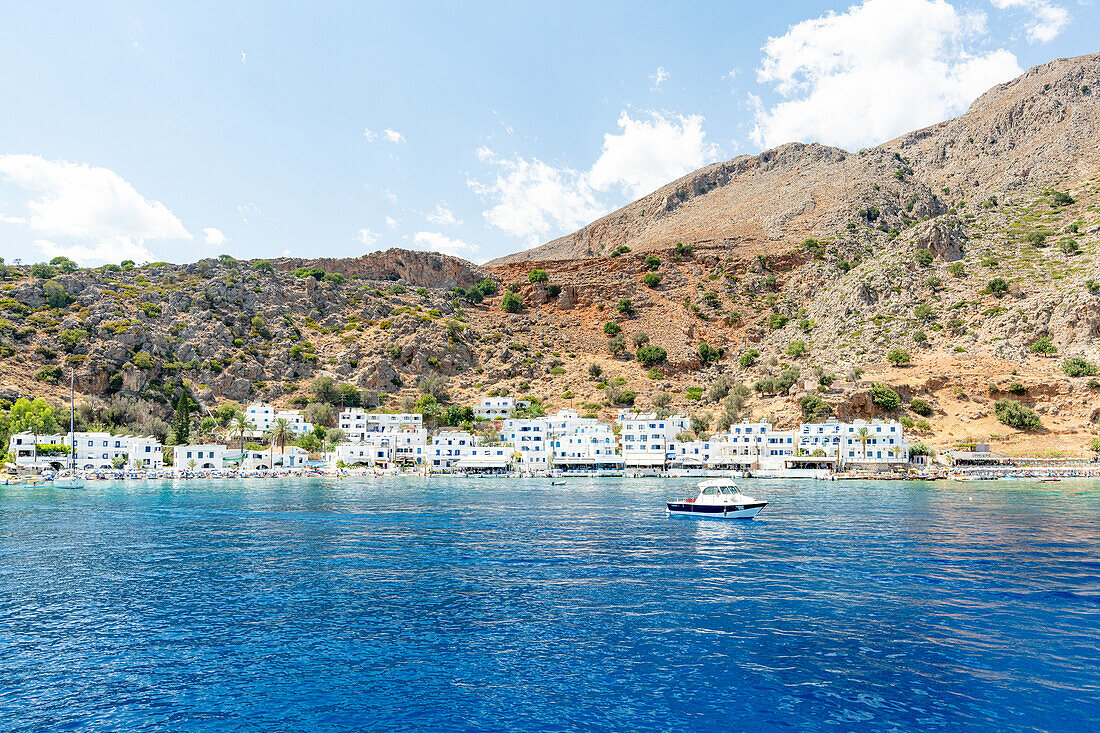 Traditional Greek white houses of Loutro village by the sea, Hora Sfakion, Crete island, Greece