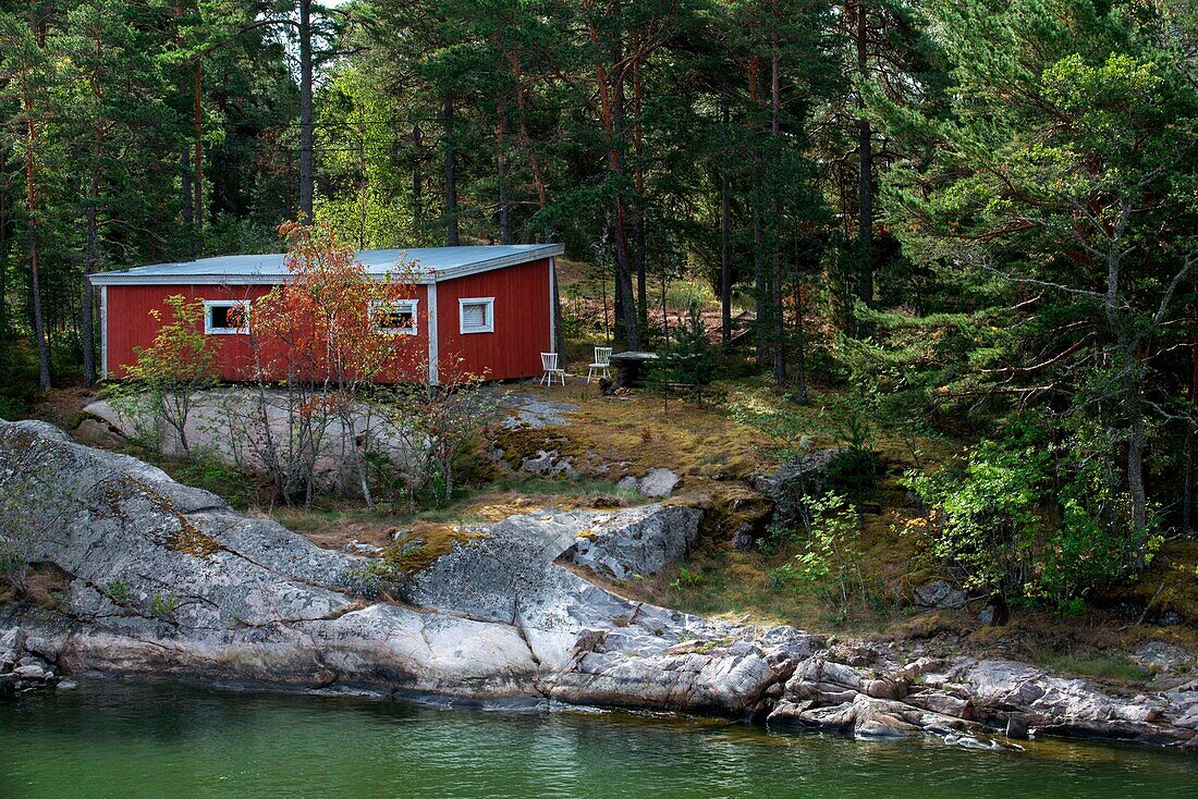 Typical wooden house in Heponiemi in Southwest Finland archipelago. The archipelago ring road or Saariston rengastie is full of things to see, do and do. The Archipelago Trail can be taken clockwise or counter clockwise, starting in the historical city of Turku, and continuing through rural archipelago villages and astonishing Baltic Sea sceneries. The Trail can be taken from the beginning of June until the end of August.