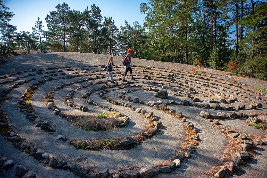 Jungfrudansen stone labyrinth in Finby near Nagu Archipelago trail Finland Southwest Finland Turku archipelago. Nature walk to a turf maze know as a “virgin dance”. This is part of St Olav Waterway, a new long distance pilgrims hiking path from Turku to Trondheim in Norway. Trondheim was the Nordic Santiago de Compostela in the Middle Ages.