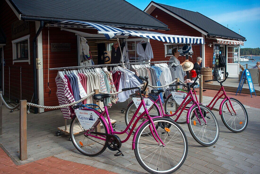 Bike rental shop and clothes and souvenirs in Marina Nagu harbour or Nauvo island in Väståboland in Pargas in Southwest Finland Turku archipelago. The archipelago ring road or Saariston rengastie is full of things to see, do and do. The Archipelago Trail can be taken clockwise or counter clockwise, starting in the historical city of Turku, and continuing through rural archipelago villages and astonishing Baltic Sea sceneries. The Trail can be taken from the beginning of June until the end of August.