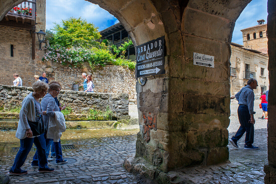 Past medieval buildings along cobbled street of Calle Del Canton in Santillana del Mar, Cantabria, Northern Spain