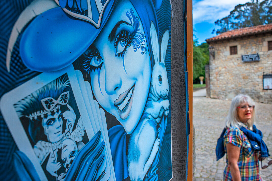 Old and vintage products and souvenirs along cobbled street of Calle Del Canton in Santillana del Mar, Cantabria, Northern Spain