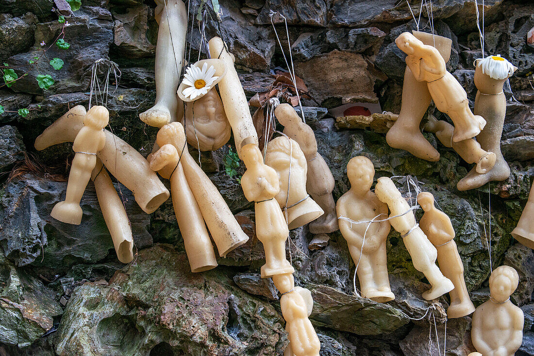 Wax body parts votive offerings at the Lourdes Grotto in the Convent of the Concepcionistas, a 1925 scale reproduction of the French grotto. Viveiro, Lugo Province, Galicia, Spain, Europe Galicia, Spain, Europe