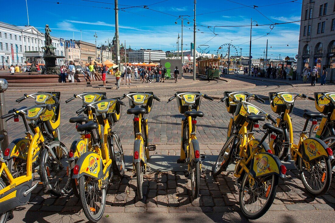 Helsinki cycling Finland, view of bikes for rent in the Helsinki City Cycle Scheme parked closely together in Kauppatori (Market Square), Finland