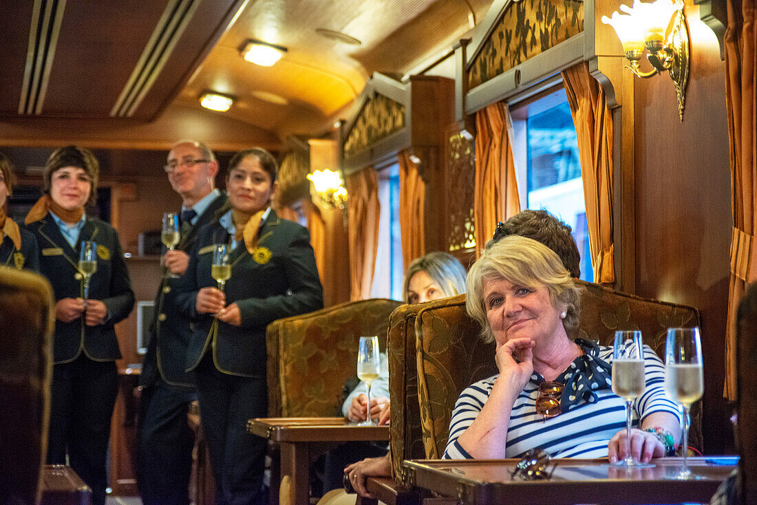 Champagne and welcomed drinks in Transcantabrico Gran Lujo luxury train travellong across northern Spain, Europe. Bilbao La concordia train station.