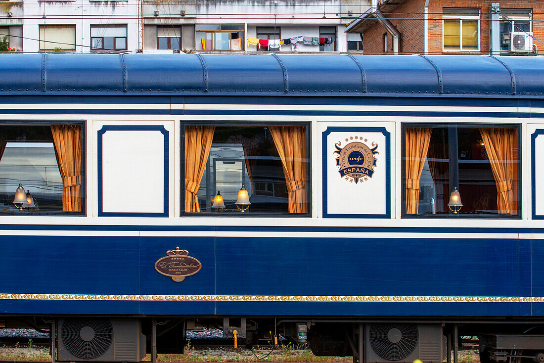 Outside one of the carriages of Transcantabrico Gran Lujo luxury train travellong across northern Spain, Europe.